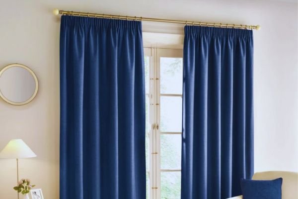 Navy blue pencil pleat curtains for the living room