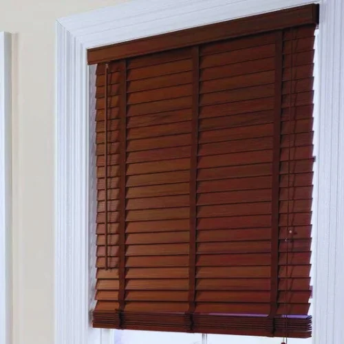 white wooden shutter blinds