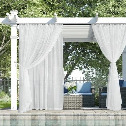 White sheer wave curtains pergola